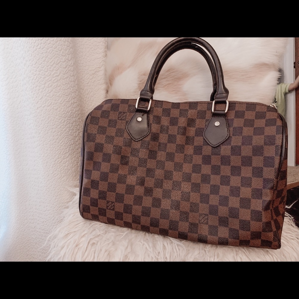Not authentic leather satchel